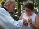 Deacon Marcia Blesses Jasim The Dove